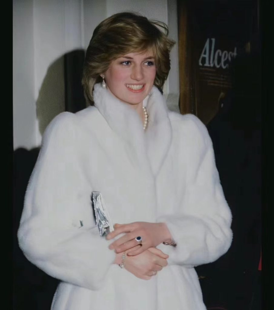 Pairing diamond jewelry with white fur makes for an elegant winter look.