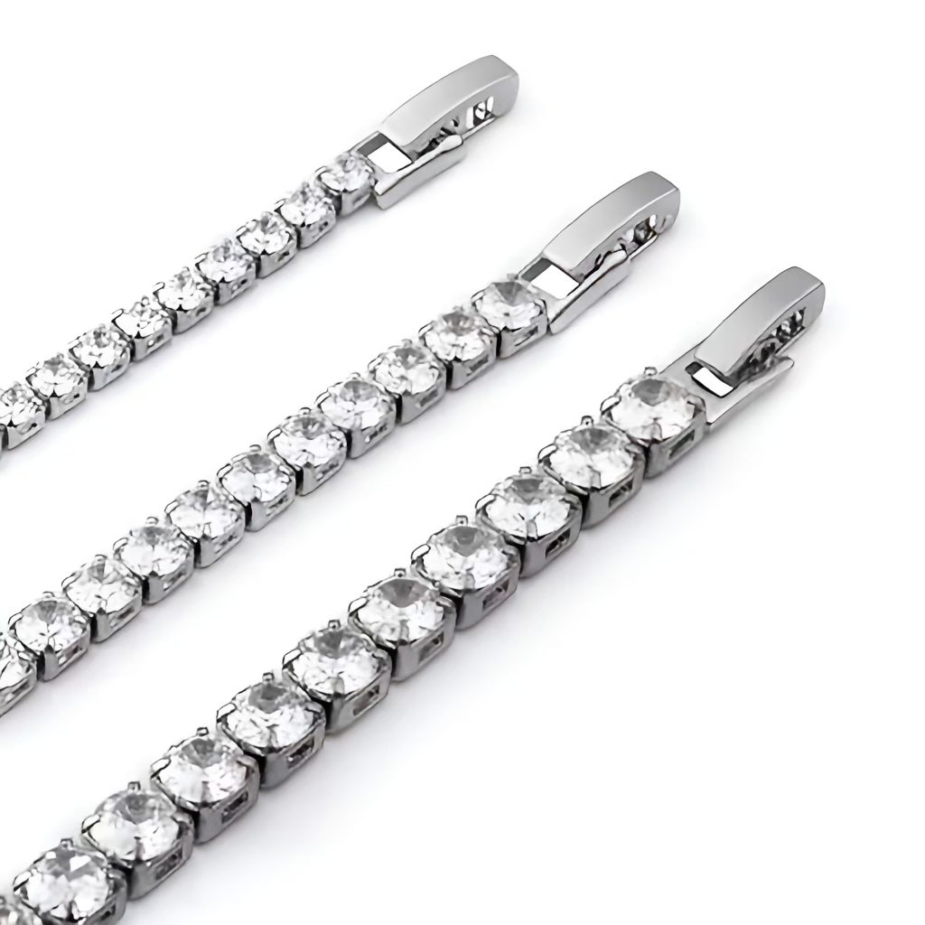 Close-set sparkling diamonds dangle on a diamond tennis bracelet.